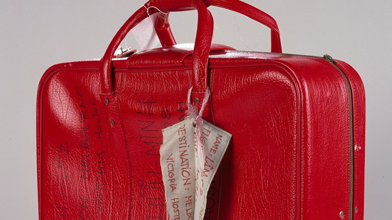 Red vinyl suitcase