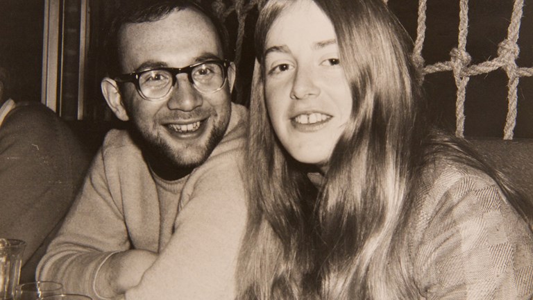 A young couple who look happy and in love.