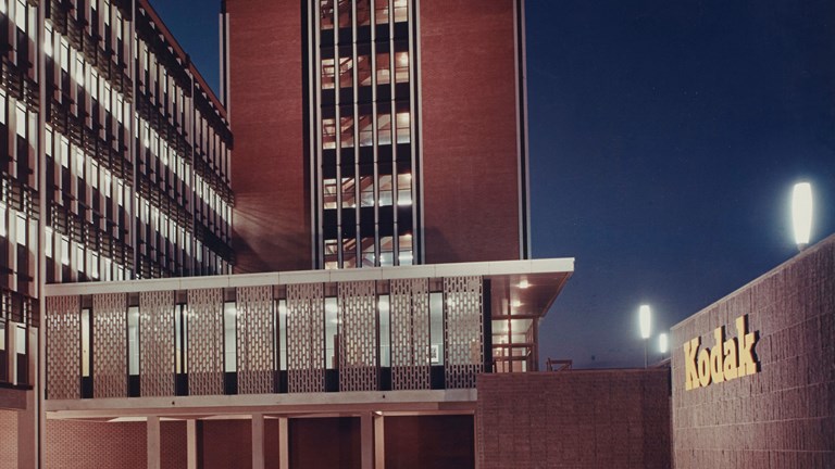 Exterior of a 1950s office building at night