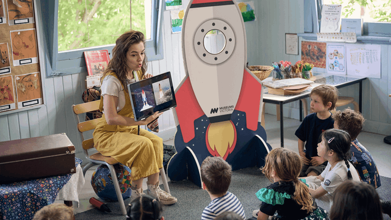 Kindergarten children learning about how astronauts journey to space using rockets during Museum Victoria's Rockets and Robots kindergarten incursion program
